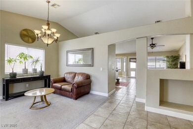 Living room at front with vaulted ceilings!