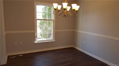 The classic Dining Room includes lots of natural l