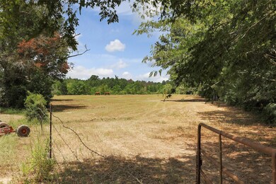 This is part of the whole 15.8 acres. The 5.8 acres is on the right side of the property and is wooded.