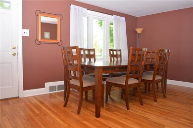 Large Dining Room with Hardwood Floors