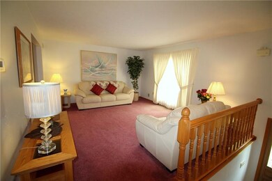 Living room has a bow window.