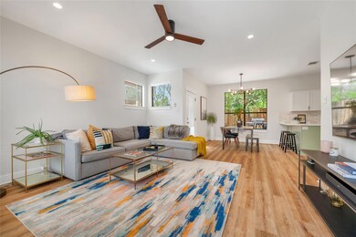 Living room featuring light wood finished floors,
