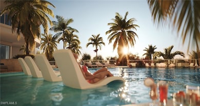 View of pool at dusk