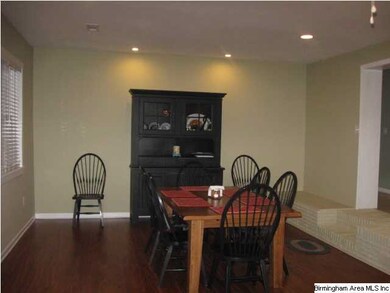 Dining area is open to living room.