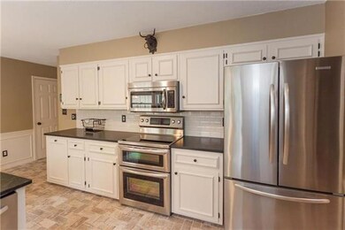 Added on extra cabinets including trash bin. High 