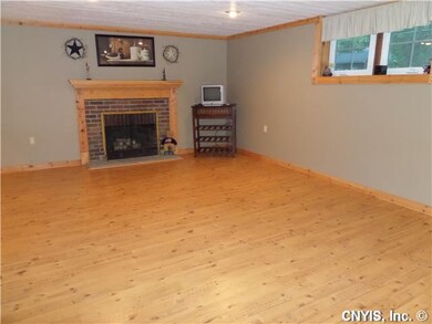 Family Room Nicely finished family rm with firepla