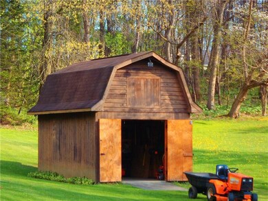 Oversized shed  for extra storage.