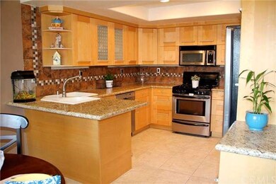 Dazzling kitchen with granite counters and updated