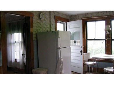 Kitchen. Looking toward rear entry,...