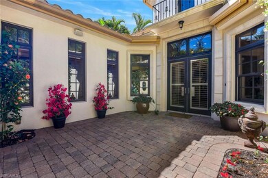 Property entrance featuring a patio, french doors,