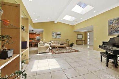 Formal entryway with double doors and decorative s