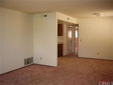Living room throuh to hallway.