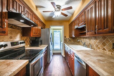 Nice Kitchen With Plenty of Cabinets.