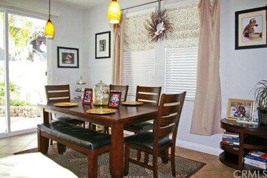 Dining Area with Window Treatments, Pendant Lighti