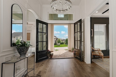 Wood floors, custom mouldings and exquisite light