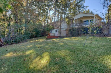 backyard with storage shed.