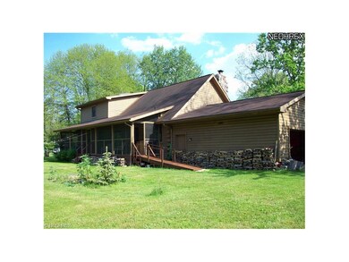 view of rear screened in porch, accessable from ki