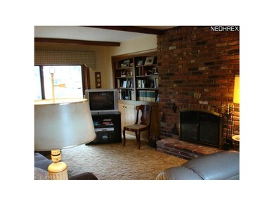 GORGEOUS FAMILY ROOM WITH WOODBURNING FOREPLACE AND GAS STARTER
