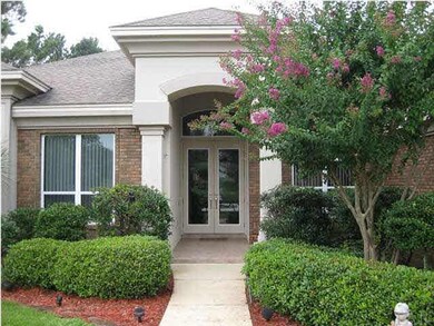An impressive home overlooking the 5th green at Stonebrook.