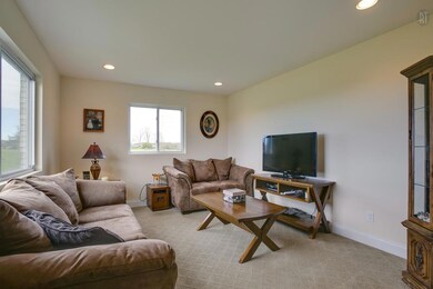 LIVING ROOM WITH AMPLE NATURAL LIGHTING