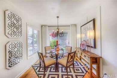 Note the engineered hardwood floor, textured walls