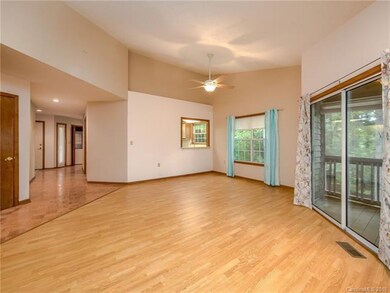 Breakfast bar and eating area off of main level living room.