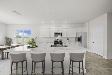 STAGED KITCHEN/DINING
