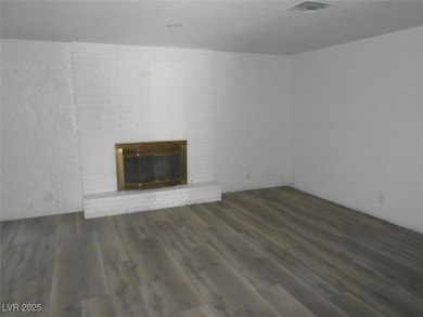 Unfurnished living room featuring a fireplace and