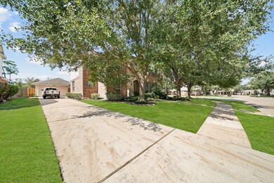 This home features a double wide, long drive way up to the garage connected to the home.