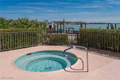 View of swimming pool featuring a water view and a