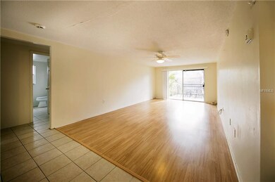 Living room with sliding doors opening to the back patio.