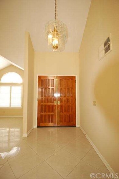 Double door entrance with beautiful marble floorin