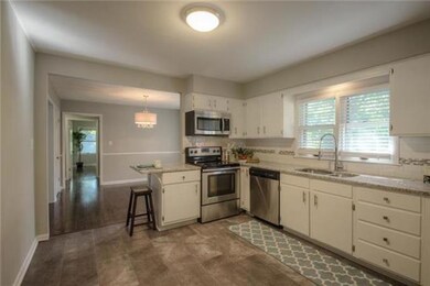 Great flow from kitchen to eating area.