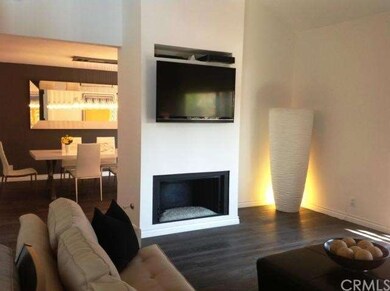 Fireplace with fireglass crystals in Family Room