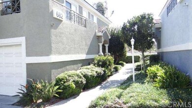 Walkway to Front Unit 2 on left