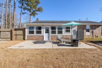 View of front of property featuring a patio area