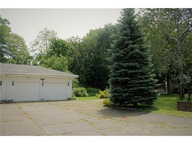 Side yard with additional parking spot