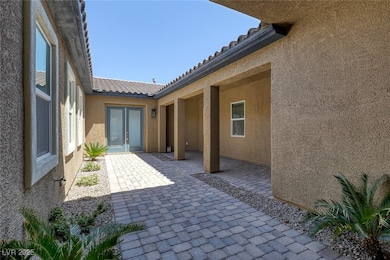 View of patio featuring french doors