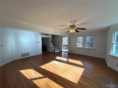 Spare room with dark hardwood / wood-style floors