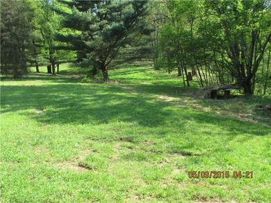 Exterior Front. Pine trees and many relaxing areas