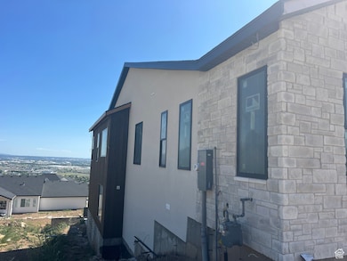 View of home's exterior featuring stucco siding