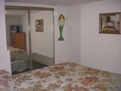 First floor bedroom with hardwood...