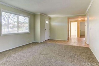 Beautiful open living room with access to front ya