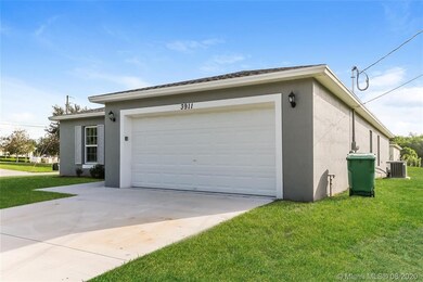 3911 SW Mcintyre St, Port St. Lucie, FL 34953 - photo 2