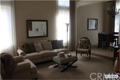 Custom window coverings and high ceilings for a dr