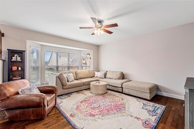 Comfy family room with a bay window overlooking the back yard!