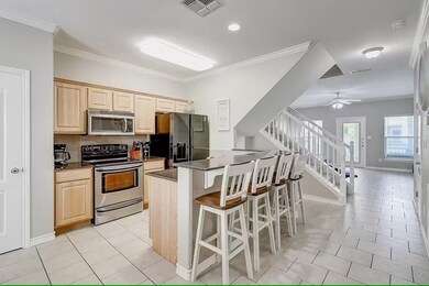 Lovely kitchen looking toward stairs and living ro
