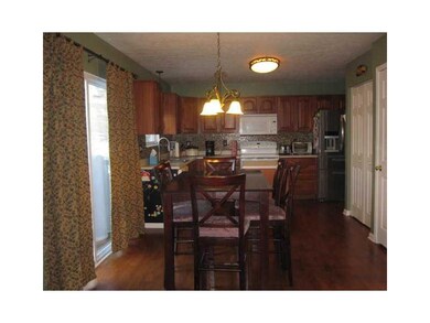 Dining Room. Eat in kitchen is open to the family 