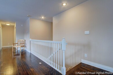 Upstairs to massive living area