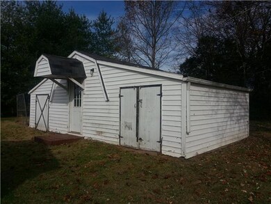 There are 3 separate workshop areas in here!...with electricity!